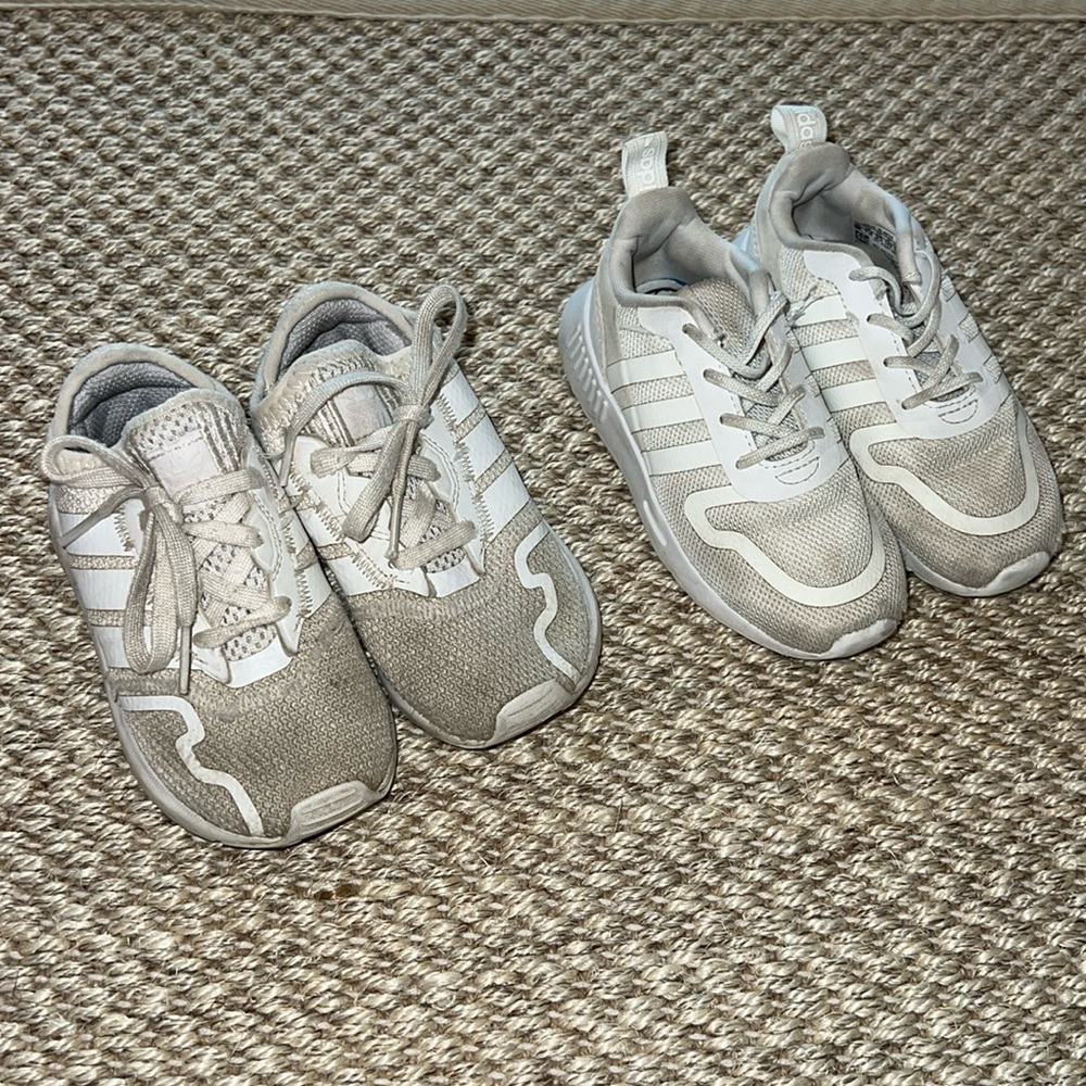 Two pairs of Adidas white tennis shoes size 8K